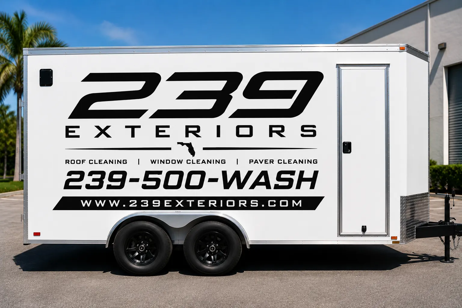 Rendering of a white enclosed trailer wrapped with the 239 Exteriors logo, the words roof cleaning, window cleaning and paver cleaning, the phone number 239-500-WASH and www.239exteriors.com, beside palm trees under a blue sky